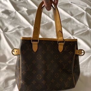 Louis Vuitton hand bag.